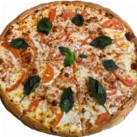 Margherita Pizza · Real Mozzarella Cheese, Garlic, Olive Oil, fresh/Shredded Basil and Fresh Tomato.