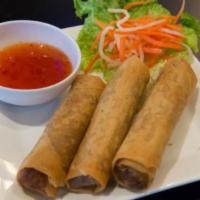 Egg Rolls · Cha gio. a combination of pork, carrots, onions, taro, and thin vermicelli wrapped in a wont...