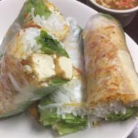Vegan Spring Rolls · Tofu, rice vermicelli, lettuce, and bean sprouts wrapped in rice paper. Served with peanut s...