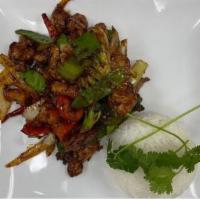 Spicy Beef Stir Fry- Bo Xao Cay · A mixture of beef, broccoli, green and red bell peppers, snow pea, onions combine with dark ...