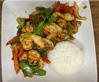 Spicy Shrimp and Squid Stir Fry - Tôm Mực Xào Cay · A mixture of shrimp and squid, broccoli, green and red bell peppers, snow pea, onions combine with House-made sauce. Served with white steamed rice.