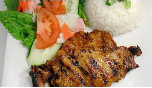 Grilled Chicken Rice Plates - Cơm Gà Nướng · Chicken breast that is marinated with onions, soy sauce, and oyster sauce. Served with white steamed rice, cucumbers and tomato.