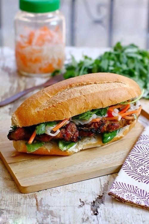 Grilled Beef Sandwich · The inside is stuffed with meat, mayonnaise, carrots, daikon, cucumbers, jalapeno and topped with cilantro.
