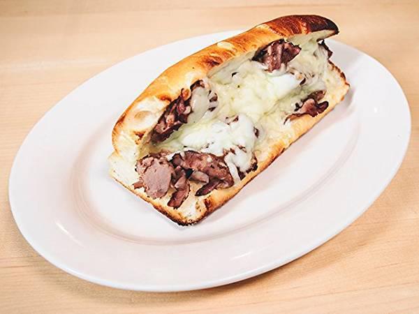 Chicago Beef (8 Inch) · A select cut of hand sliced roast beef dipped in au jus and topped with mozzarella cheese.
