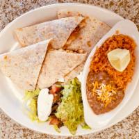 Chicken Quesadilla · Chicken. Served with rice, beans, lettuce, and pico de gallo.