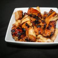 Bourbon Chicken · Our signature dish, grilled chopped marinated chicken served with our homemade bourbon sauce 