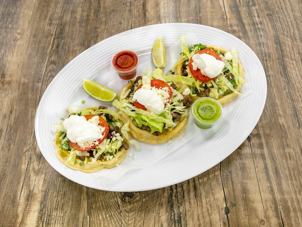 6. Sopes · Chicken, steak, pork, pastor, chorizo, barbacoa lamb and beef or ground beef, all come with lettuce tomatoes onions cilantro cheese sour cream salsas verde.