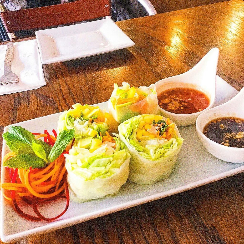 Fresh Summer Roll · Mixed greens, shredded mango, carrot, tofu and mint wrapped with rice sheet, served with hoisin tamarind sauce.
