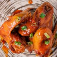  Sweet Chili Jumbo Wing · Jumbo wings marinated with Thai sweet chili sriracha sauce.