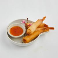 Shrimp Fritter · Marinated shrimp wrapped in spring roll skin served with Thai sweet chili sauce