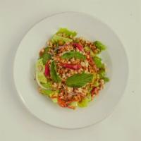 Larb Chicken Salad · Ground chicken tossed in mixed Thai herbs with chili lime dressing.