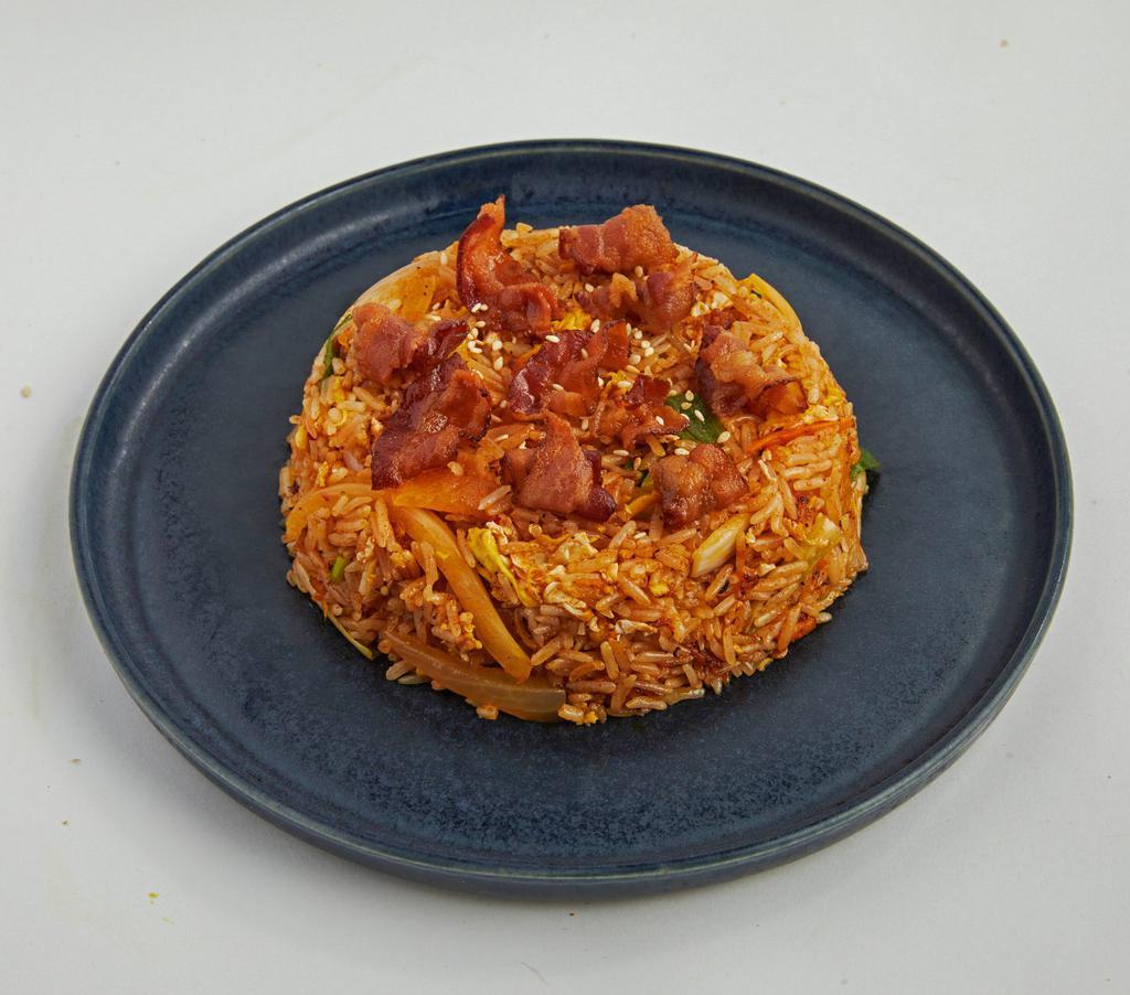 Kimchi Fried Rice · fried rice with egg, onion, scallion, kimchi, bacon in spicy korean sauce.