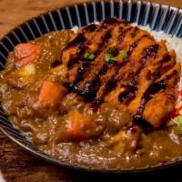 Japanese Curry Rice · japanese curry served over rice, shredded cabbage, rakkyo, fukujinzuke.