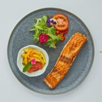 Salmon Mango · Grilled salmon topped with Thai style mango salad , lime dressing. Served with rice.