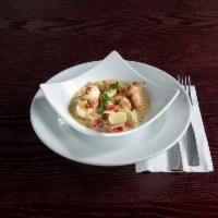 Camaron al Ajillo · Shrimp cooked and served in house made garlic sauce.