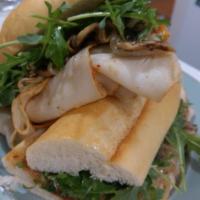 Gorgonzola Sandwich · Seasoned turkey, rogue creamery blue cheese, sauteed onion and mushrooms, arugula, house-mad...