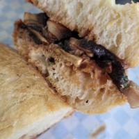 Got No Beef Wit Jus Sandwich · Sauteed mushrooms stuffed into a toasted baguette, served with a side of homemade mushroom a...