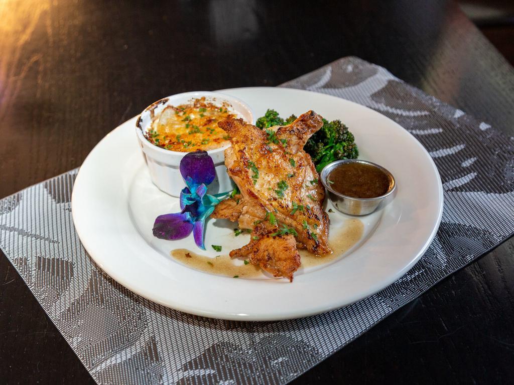 French Chicken Breast · Served with potato au gratin and broccoli.