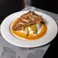 Orange Citrus Glaze Sea Bass · Served with roasted garlic mash potatoes, roasted brussel sprout, and carrots.