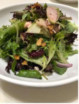 House Salad · Mixed greens, cherry tomatoes, cucumbers, red onions, and lemon vinaigrette.