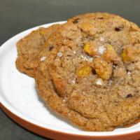 jojo cookie · Blue cornmeal cookie with dark chocolate chips, corn nuts, and toffee bits, sprinkling of se...