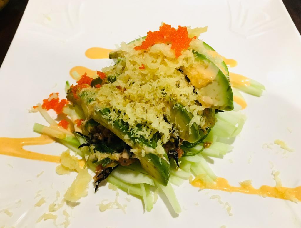 Spicy Tuna Salad · Spicy tuna, green seaweed, black seaweed, cucumber, avocado and tempura crunch on top with caviar.