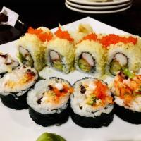 Chilean Crunch Roll · Tempura Chilean sea bass, crab and avocado with tempura crunch and caviar on top. Cooked.