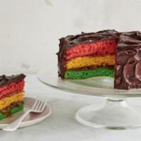 Italian Rainbow Cake Slice with Whip Cream · This colorful cake filled with raspberry, almond, and chocolate flavors, will be a hit at yo...