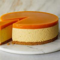 Mango Cheesecake Slice with Whip Cream · Full of mango! Our famous NYC cheesecake slice topped with homemade mango topping!