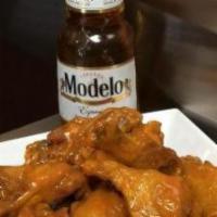 4 Beers and 15 Buffalo Wings · Must be 21 to purchase.