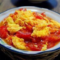 Scrambled egg w. tomatoes 番茄炒蛋 · 