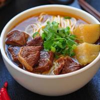 Braised Beef Noodle Soup 红烧牛肉面 · Savory light broth with noodles. 