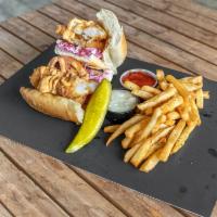 Country Boy · Southern Fried Catfish w/ Slaw, Tomato, Pickles and Red Onion, topped w/ House Po' Boy Sauce