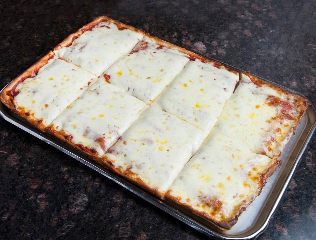 Sicilian Cheese Pie · Fresh gooey Mozzarella cheese on a thicker crust. Traditional square fave!