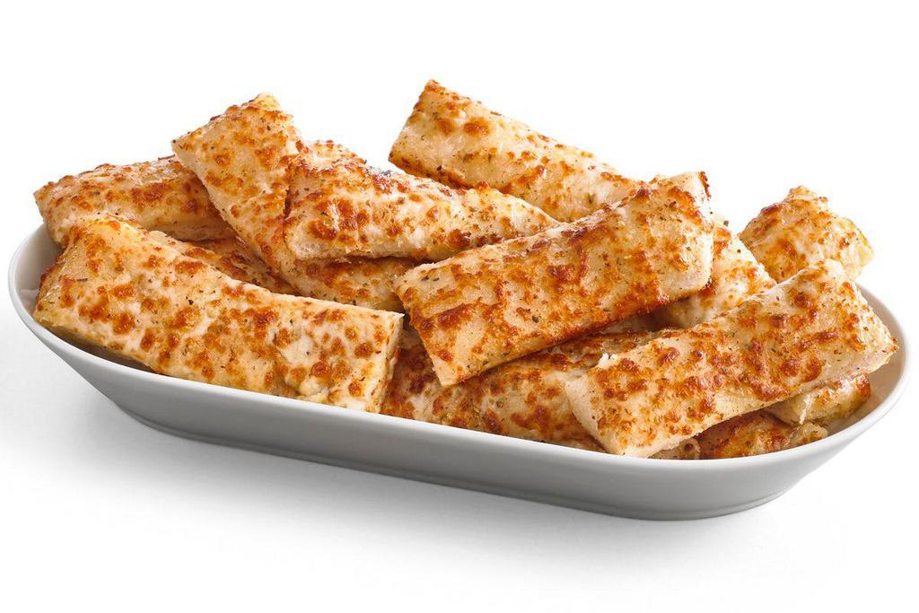 Garlic Cheesy Bread · Crispy, yet tender breadsticks made with our Pan dough. Brushed with garlic butter and sprinkled with 100% real cheese and Parmesan oregano seasoning.  (16 Slices)

*Calories listed are by slice