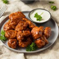 BBQ Boneless Wings · Pub style BBQ boneless wings with our double fry method.