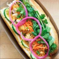 Banh Mi Sandwich · A Crisp Baguette with your choice of filling, sauce, and toppings served with Chili Lime Sau...