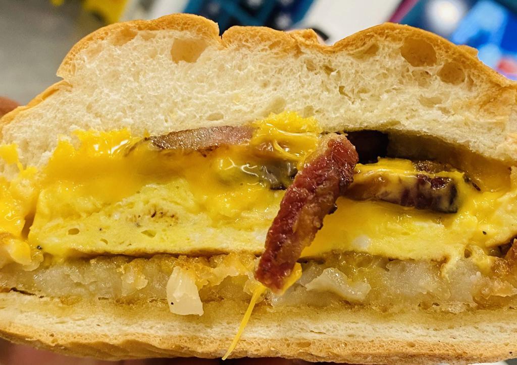 Egg & Cheese on a Roll · Includes Hashbrowns.  Add a protein for $2