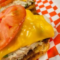 The Melt · Choose Tuna or Chicken; with Cheddar cheese;  scallions, chives, mayo; served open face on T...