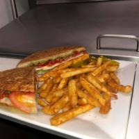 Chicken al Pesto Panini · Grilled chicken, pesto, roasted peppers, red onions and provolone.