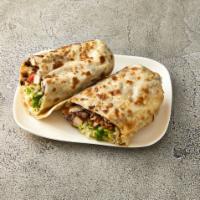 Burrito Dinner · One burrito served with a side of rice and beans. A giant flour tortilla filled with lettuce...