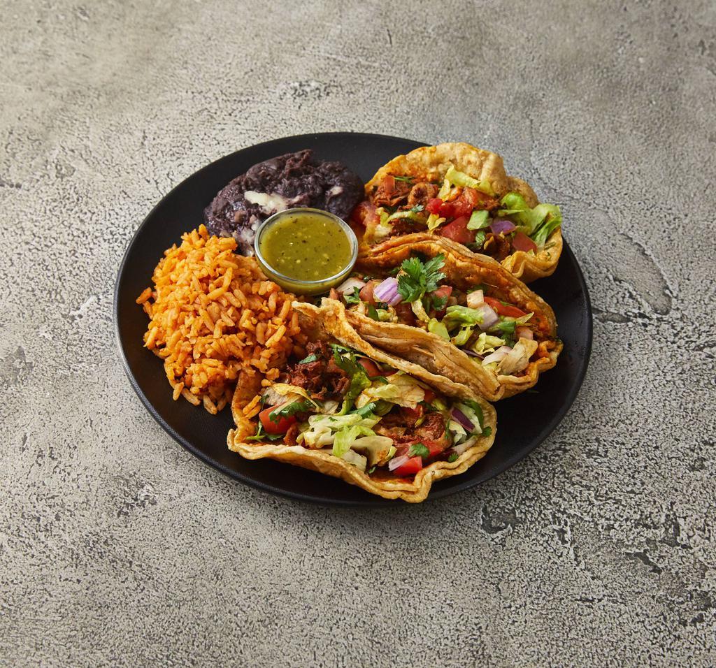 Taco Dinner · Three tacos served with a side of rice and beans. Corn or flour tortilla filled with lettuce, tomato, cilantro, onions and your choice of meat or veggies.