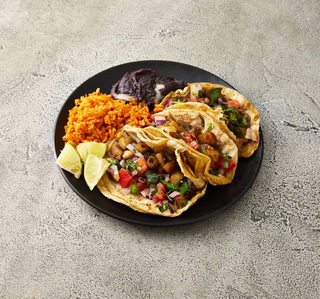 Fish Taco Dinner · Three tacos served with a side of rice and beans. Grilled tilapia filled with pico de gallo (onions, tomatoes, cilantro and jalapenos). Corn or flour tortilla.
