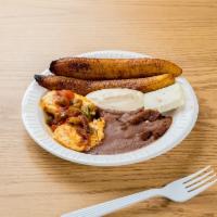 Huevos Estrellados · Fried eggs. Served with beans, cream, cheese, and sweet plantain.