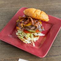 Bacon and Cheddar Burger · Served with lettuce, tomato, pickles, and onion.