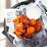 Fried Pickles · Seasoned, battered pickle spears served with Parmesan and ranch. Extra ranch dressing for an...