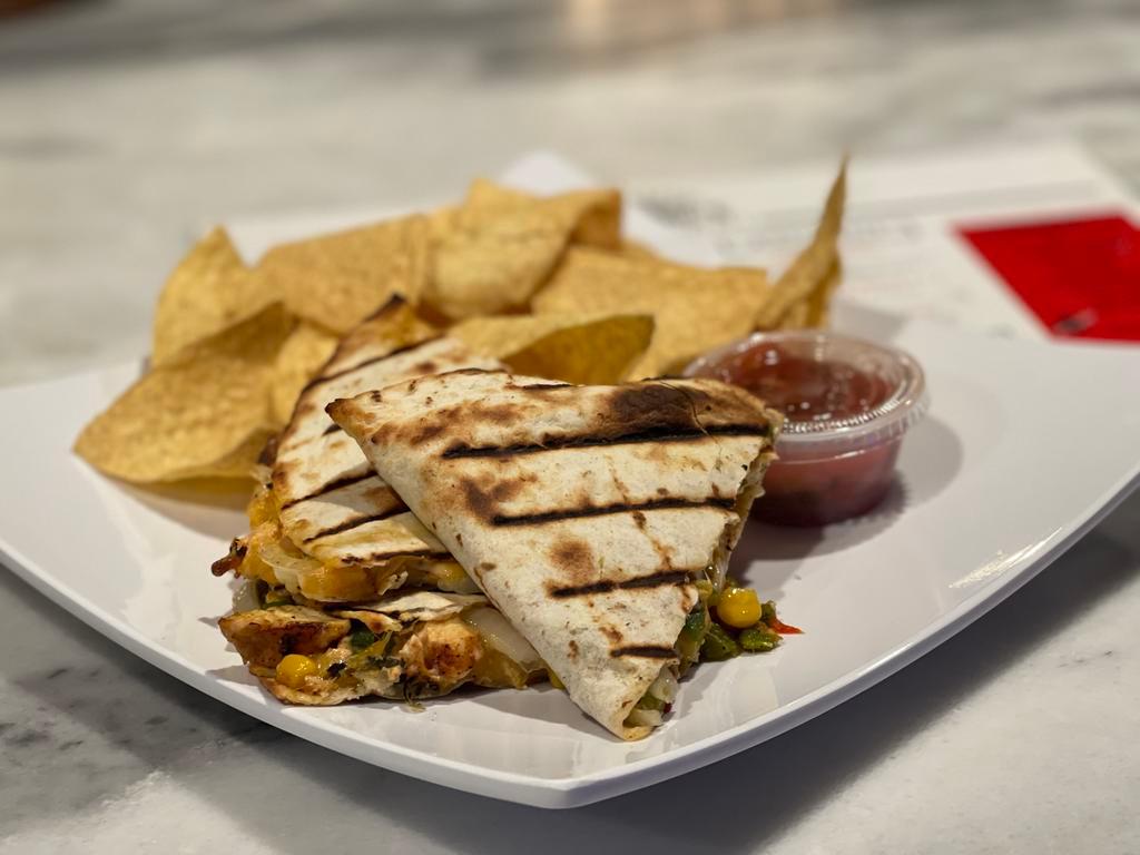 Scenic Quesadillas · Shredded cheese, green chile, corn, onions, jalapeno, tomatoes, sour cream. Side of tostadas and salsa. Add chicken, steak or shrimp for an additional charge. 