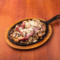 5 Points Fajitas · Grilled chicken, steak, shrimp and smoked sausage with onions and topped with melted cheeses...