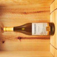 Woodbridge Chardonnay 750ml  · Woodbridge Chardonnay displays aromas of tropical fruit with a hint of cinnamon and maple, l...