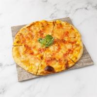 Margherita Pizza · Mozzarella, San Marzano tomato sauce and fresh basil.
